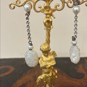 Stephen Dweck carved white mother of pearl clip on earrings